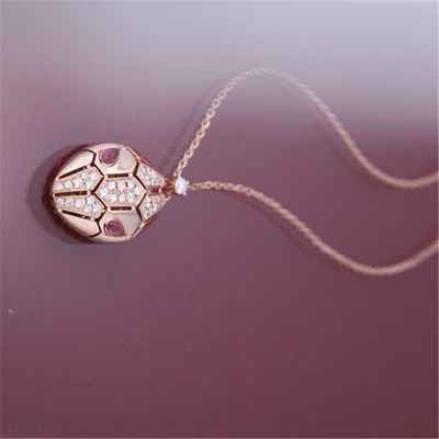 Chất lượng Vòng cổ Serpenti La Mã bằng vàng hồng 18 kt với mắt rubellite và trên đầu có đính kim cương pavé nhà máy